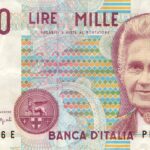 Vecchie monete da lire con l'effigie di Maria Montessori, simbolo di valore storico e numismatico.